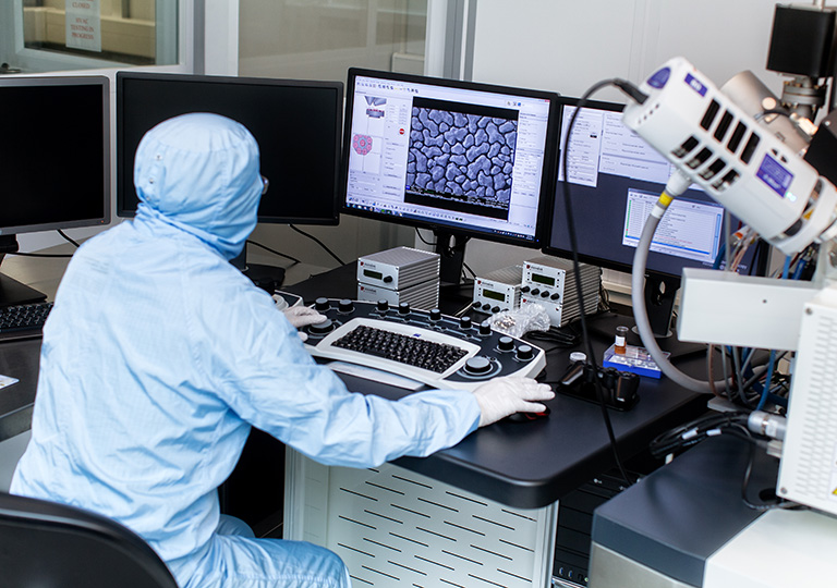 Researcher preparing graphene sample